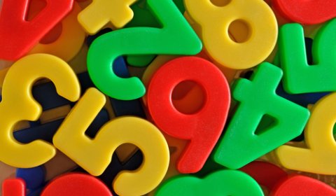arrangement of colourful plastic numbers